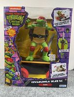 Front view of boxed Raphael RC figure