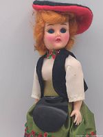 Side view of doll in full costume