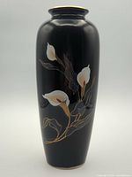Full view of black porcelain vase with floral design