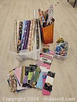 Overview of wrapping paper, tissue packs, gift bags, bows
