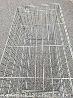 Top view of metal wire dog crate showing interior and wire spacing