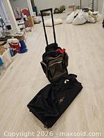 Disney duffle and Kodiak backpack on floor showing overall size and design