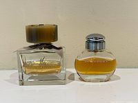 Both Burberry perfume bottles side by side