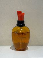 Front view of bottle with cap on