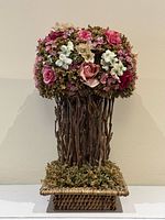 Full view of artificial floral topiary arrangement