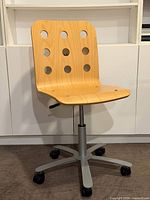 Full view of IKEA Jules office chair showing seat, back, and base