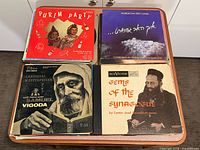 Stack of albums showing Purim Party!, Hebrew-titled LP, Cantorial Masterpieces, Gems of the Synagogue