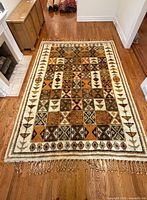 Full view of wool rug showing pattern and size