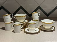 Group of all cups and saucers showing counts and pattern