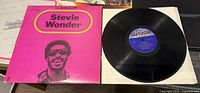 Stevie Wonder "Looking Back" cover and record visible