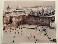 Full view of snowy Western Wall scene photograph