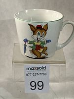 Front view showing rabbit graphic and mug form