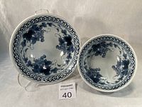 Overhead view of both Arita bowls displaying interior grapevine pattern