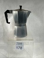 Front view of aluminum moka pot showing overall design