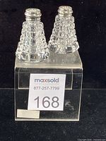 Front view showing both pyramid-form shakers