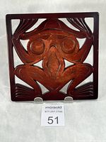 Front view of square frog trivet