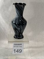 Front view of vase showing full shape and swirl pattern