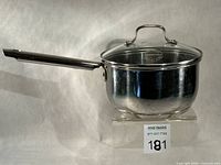 Side view of saucepan with lid showing overall shape and finish