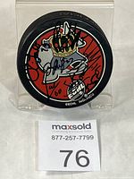 Front view on stand showing team crest and signatures