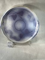 Angled front view of platter on stand