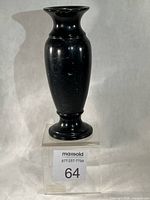 front view of black marble vase