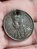 Obverse of 1915 Canadian cent showing King George V, hole near rim