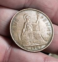 Reverse of 1967 UK penny showing Britannia, ONE PENNY legend, date