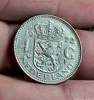 Obverse showing crowned coat of arms, year, denomination