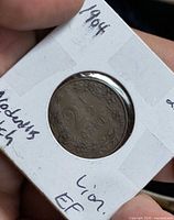 Reverse of 1904 Netherlands 2½ cent coin in holder