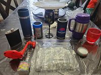 Overview of all drinkware and accessories on table