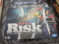 Closed Risk game box top showing artwork and logo.