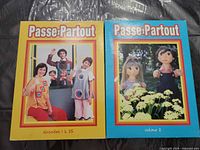 Front covers of two Passe-Partout Volume 2 DVD box sets, Episodes 1-25