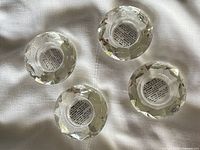 Four matching faceted crystal tealight holders top view