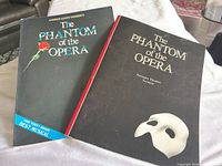 Front covers of both the sheet music book and the Toronto souvenir programme
