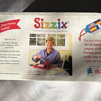 Retail box front showing Sizzix branding and machine image