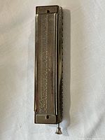 Full view of harmonica front with model name