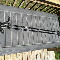 Full view of both 120 cm walking poles showing handles and shafts
