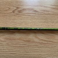 Full view of green Aldila RIP NV shaft graphics