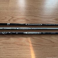Two Diamana shafts showing model graphics and weight markings 60 and 72
