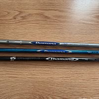 Three Diamana shafts showing model markings and weights