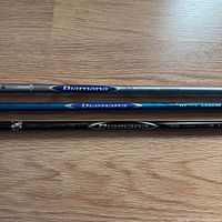 Full view of three Diamana shafts showing branding and colors