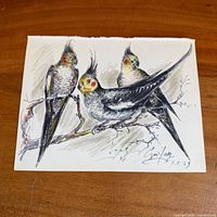 full view of signed drawing showing three birds on branch