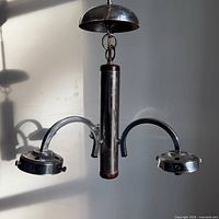 Full view of chandelier showing stem, arms, bulb housings