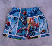 Front view of Avengers print shorts