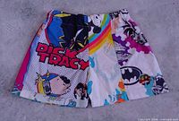 Front view of patchwork shorts showing Dick Tracy, Batman, rainbow motifs