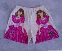 Front view of Barbie print shorts