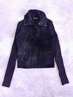 Full view of front showing suede panels, knit sleeves, collar, pockets