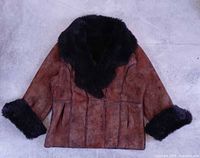 Full view of front showing overall style, color, faux fur collar and cuffs