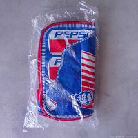 Lunch bag cooler in original plastic wrap showing Pepsi and KFC graphics