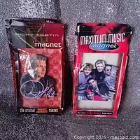 Both packaged magnets side by side showing fronts and packaging condition